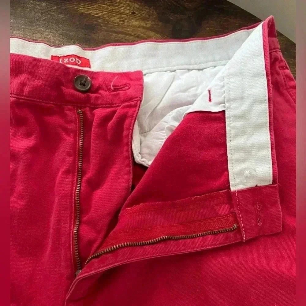 IZOD | men’s red flat front shorts. Size: 38​
